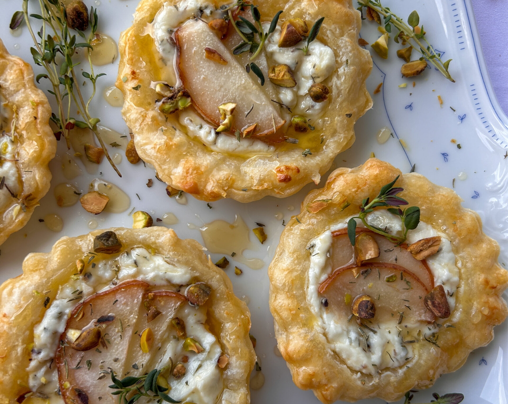 Easy Honey Glazed Goat Cheese Tarts With Edible Pansies suggested serving