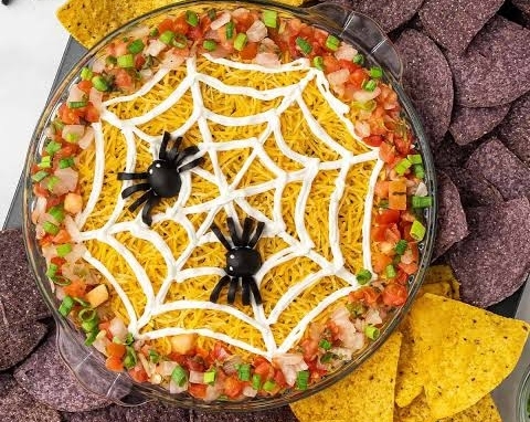 The Best Spiderweb Taco Dip Recipe Ever suggested serving