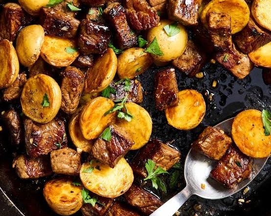 Viral Garlic Butter Steak Bites and Crispy Potatoes top view